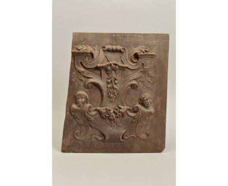 AN 18TH CENTURY CARVED RECTANGULAR WALNUT PANEL, the relief decoration of cartouche shape with caryatid scrolls and foliage, 