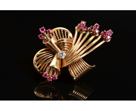 A LATE 20TH CENTURY 18CT GOLD, RUBY AND DIAMOND FAN DESIGN BROOCH, estimated modern round brilliant cut weight 0.18ct, measur