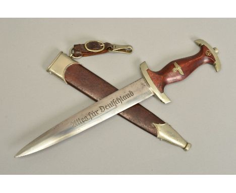 A GERMAN 3RD REICH ISSUE 'SA' DAGGER AND SCABBARD, the grip has the usual SA logo and Eagle swastika badge inlaid, the blade 