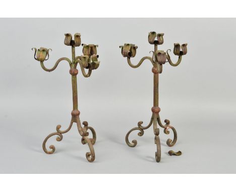 A PAIR OF FIRST HALF 20TH CENTURY PAINTED WROUGHT IRON FOUR LIGHT CANDELABRA, with central petal shaped holder surrounded by 