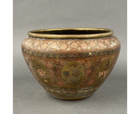 A 19th/early20thC Indian engraved and painted brass planter, dia 33cm.