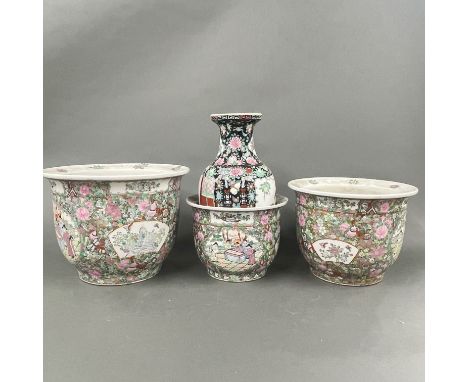 A graduated set of three Chinese Canton enamelled porcelain planter, largest dia 32cm. Together with a Famille Noir porcelain