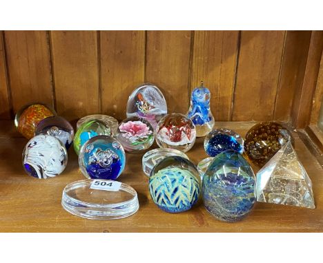 A group of vintage glass paperweights, some signed, tallest H. 9cm.