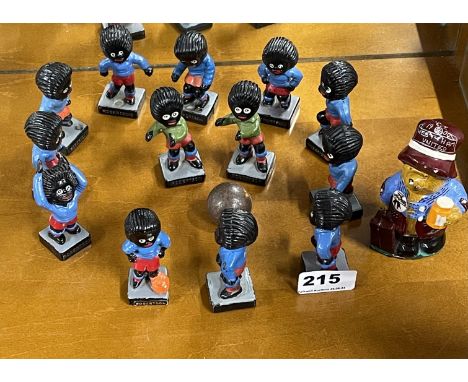 A group of vintage mixed plastic and 'chalk' Golly football players. Together with a Westham United Paddington. Notice from t