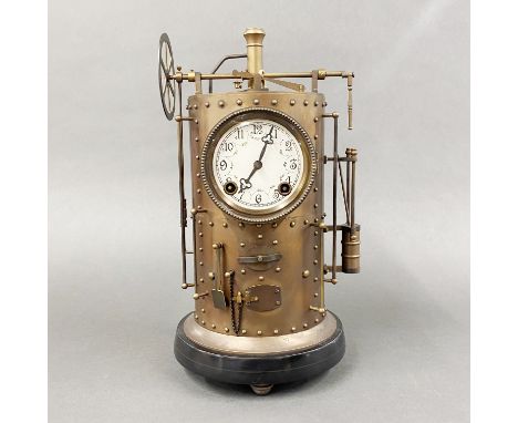 A brass/bronze industrial style vertical steam boiler mantle clock, H. 43cm.