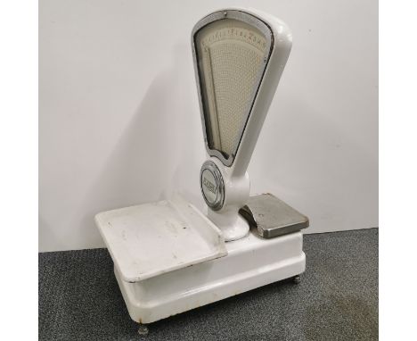 A large enamelled avery shop scale.