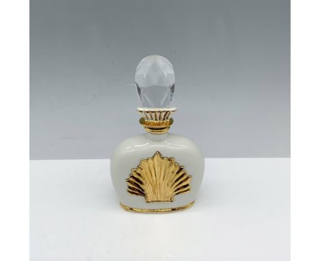 Fabulous container used to store fragrance that has a gilt shell design and is topped with a Swarovski crystal stopper. Capod