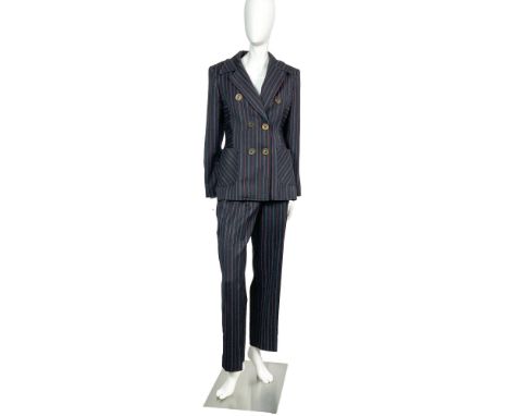 A stunning vintage two-piece wool ensemble featuring a dark gray blazer with a white and red striped pattern and gold-colored