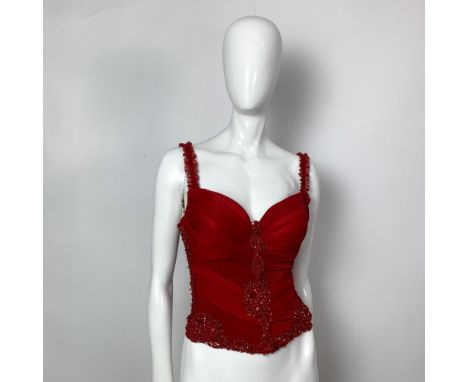 A vintage ruched red mesh bustier adorned with red lace and embellished with sequins and beads. Bust: 14"W. Waist: 10"W. Full