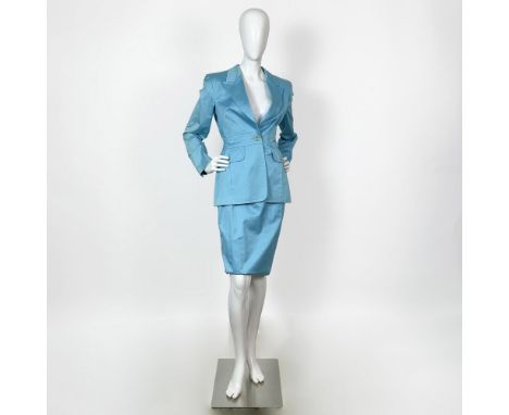 Original Louis Feraud turquoise business skirt suit. The fitted blazer features a notched collar, a waist band, two side pock