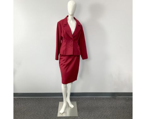 A vintage classic ensemble featuring a red blazer with a satin burgundy lining and a matching pencil skirt. Bust: 15"W. Sleev