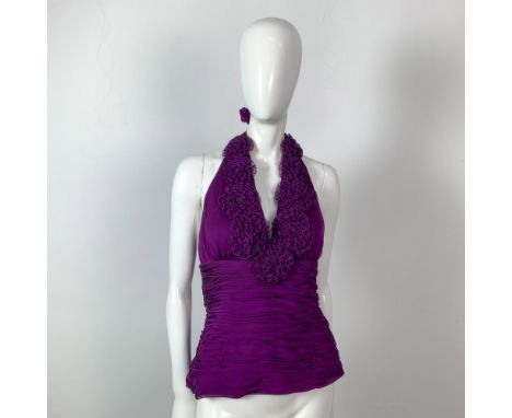 A vintage rich purple ruched halter top adorned with stunning rosettes along the neckline. Bust: 16.5"W. Waist 15.5"W. Full l