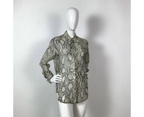 Original vintage Emanuel Ungaro animal snake print flowing sheer silk blouse with pointed collar, front closure, and cuff lin