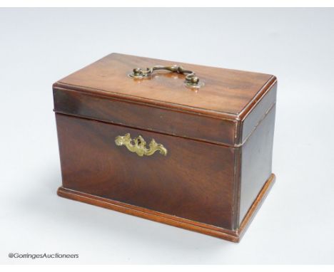   A George III mahogany tea caddy, with a concealed drawer to one end, width 22cm height 14cm
