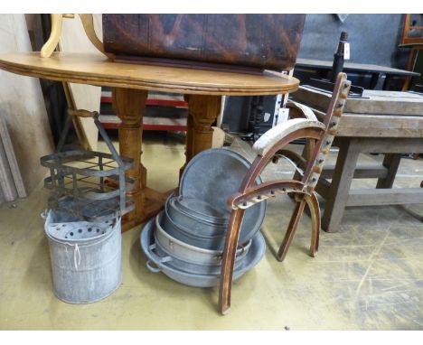   A pair of cast iron bench ends and assorted galvanised metal items