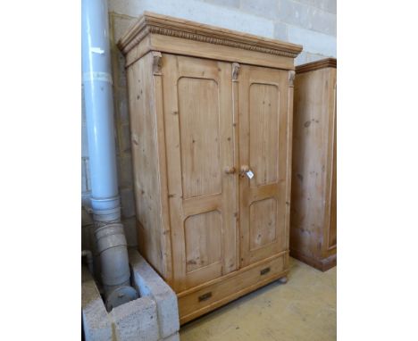   A 19th century East European pine two door wardrobe, length 118cm, depth 53cm, height 188cm