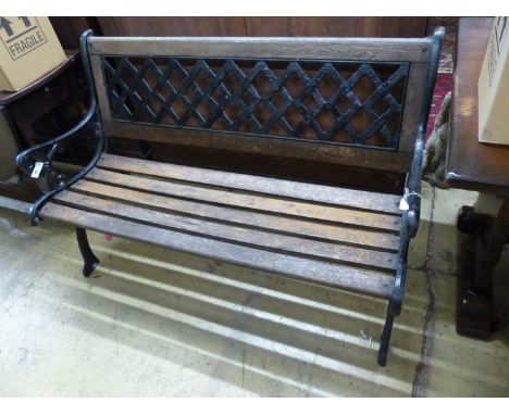   A painted cast metal slatted garden bench, length 127cm, depth 65cm, height 83cm