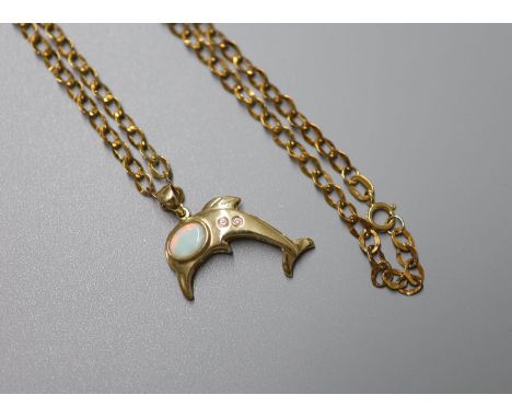   A modern 9ct gold, white opal and two stone diamond chip set dolphin pendant, 24mm, on a 9ct gold chain, 44cm, gross weight