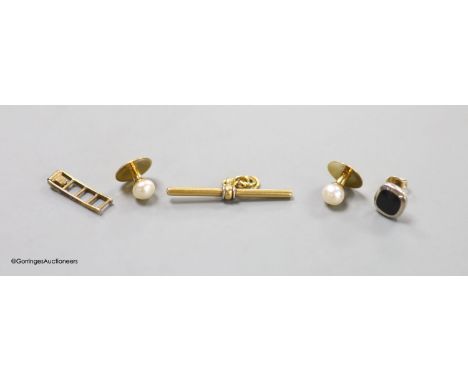   A 18ct &amp; Pt 'T bar', 2.6 grams, a pair of 18ct and cultured pearl set dress studs, gross 2,2 grams, a 9ct ladder charm 