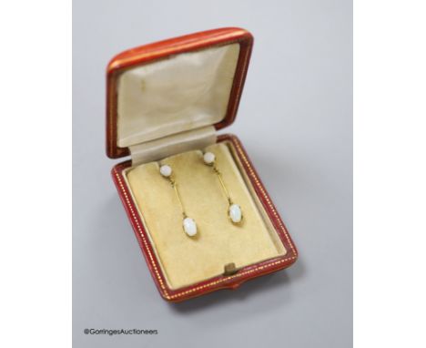   A pair of 9ct and two stone white opal set drop earrings, 36mm, gross 2.9 grams (one of the appears to be a replaced simula