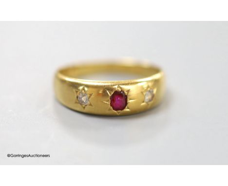   A Victorian 18ct gold and gypsy set, ruby and diamond three stone ring, size M, gross 3.5 grams.