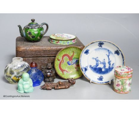   A small miscellaneous Oriental collection including enamel snuff boxes, Buddha carvings etc.
