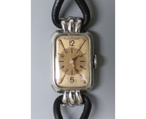   A lady's Art Deco stainless steel Jaeger LeCoultre rectangular dial wrist watch, on a fabric twin strand strap,case diamete