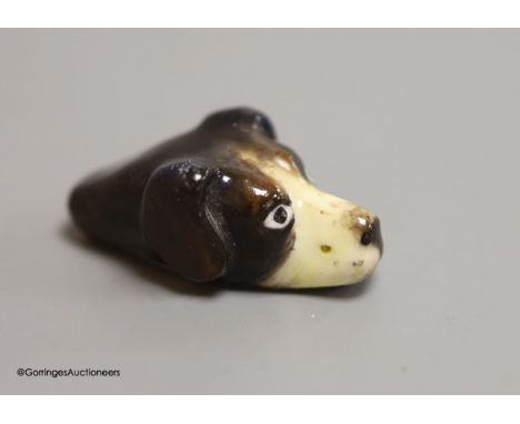   A Royal Worcester beagle head whistle