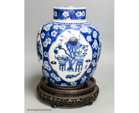   A Chinese blue and white 'Hundred Antiques' jar, Kangxi mark, c.1900