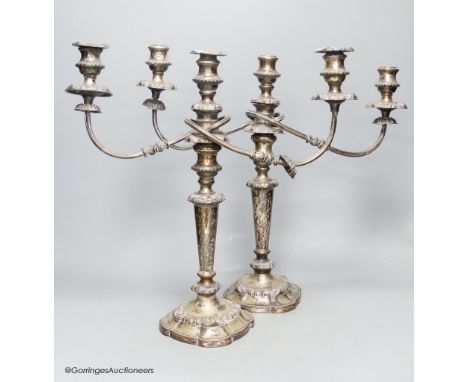   A pair of silver plated two branch three light candelabra, height 40cm