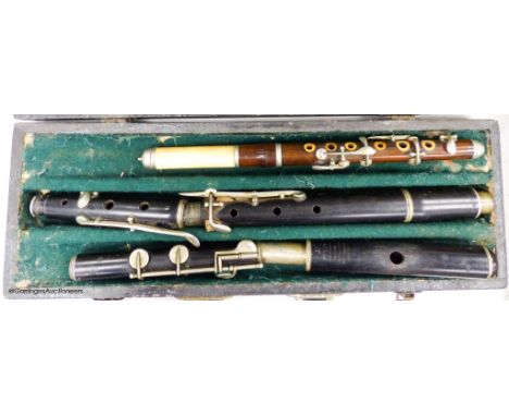   An incomplete Jerome Thibonville Lamey clarinet and an ivory and wood flute