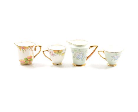 Two early 20th century part tea sets by Taylor &amp; Kent, and another part service by Royal Stafford, all with gilt detailin