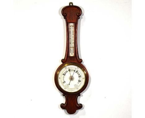 Oak cased aneroid barometer, with thermometer, 84cm, and a similar smaller barometer.Qty: 2Condition report:Largest in genera