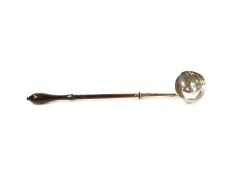 George II silver ladle, indistinct makers mark, London 1735, plain oval bowl, turned fruitwood handle, length 32.5cm.Conditio