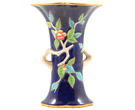 Royal Worcester vase, flared form, relief moulded with flowering branches, printed mark, 17cm.Condition report:Fine surface s