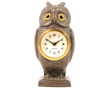 Novelty German owl mantel clock, cast pewter case formed as a standing owl with inset glass eyes, fitted with a later dial an