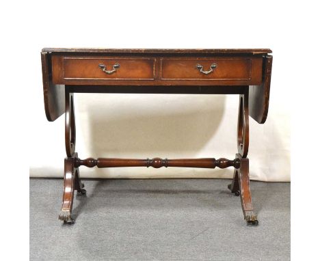 Reproduction mahogany sofa table, rectangular top with two drop leaves, two frieze drawers, lyre supports in splayed legs wit