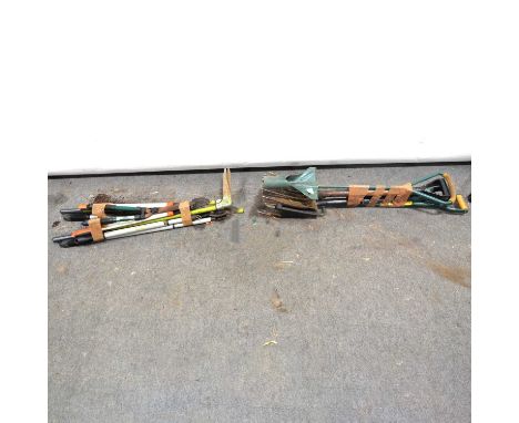 Various garden hand tools. Including rakes, spades and forks.