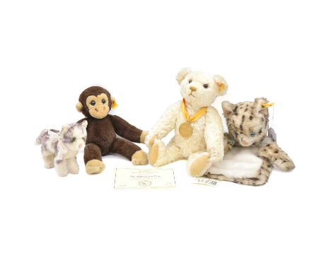 Steiff, four including Teddybar 32 Millennium teddy bear, 30cm, with tag and certificate; hand puppet in the shape of a cat; 