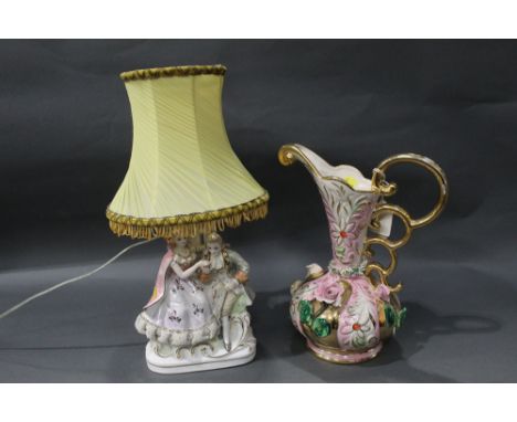 Decorative table lamp with continental figural base and ornamental jug 