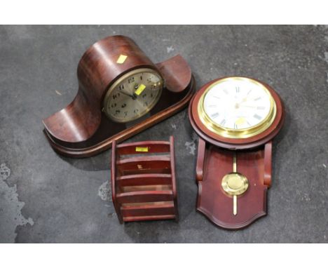 Wall clock, mantle clock and rack
