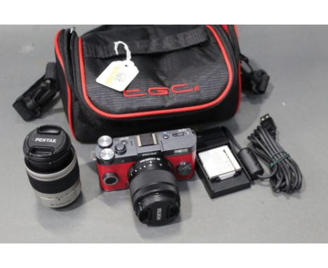 Pentax Q-S1 digital camera, O6 telephoto zoom lens and carrying case