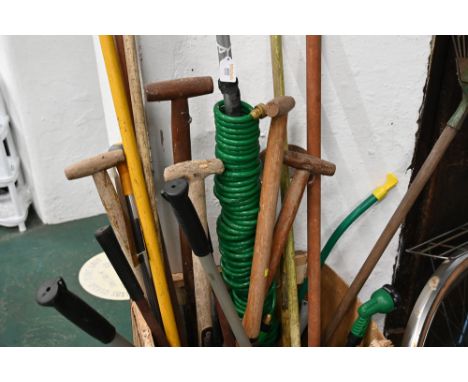 Garden tools, shovels, rakes, garden hose etc