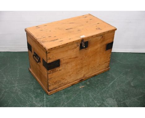 Stripped pine trunk with metal handles and straps, height 43 cm, width 65 cm, depth 37 cm