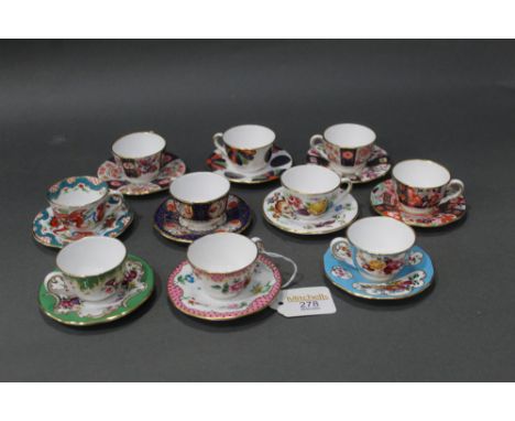 Miniature Royal Worcester cups and saucers