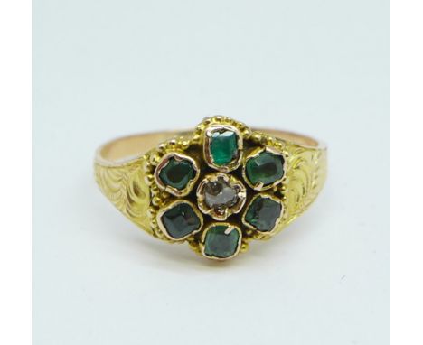 A Victorian yellow metal, emerald and diamond cluster ring, tests as high carat gold, 1.6g, K 