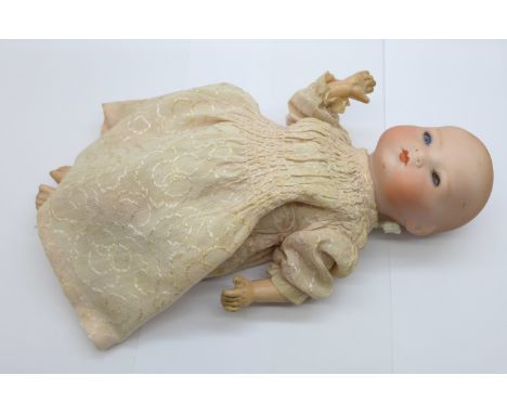 A small Armand Marseille doll, 3N 1310 K, head detached 