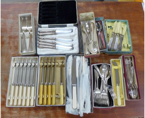 A collection of flatware; including a cased set of six silver handled knives, silver plated forks and spoons, Walker &amp; Ha