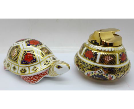 A Royal Crown Derby 1128 pattern table lighter and a turtle paperweight, (2) 