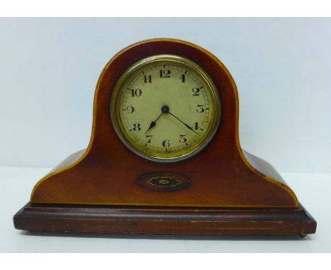 An inlaid mantel clock, brass bezel 